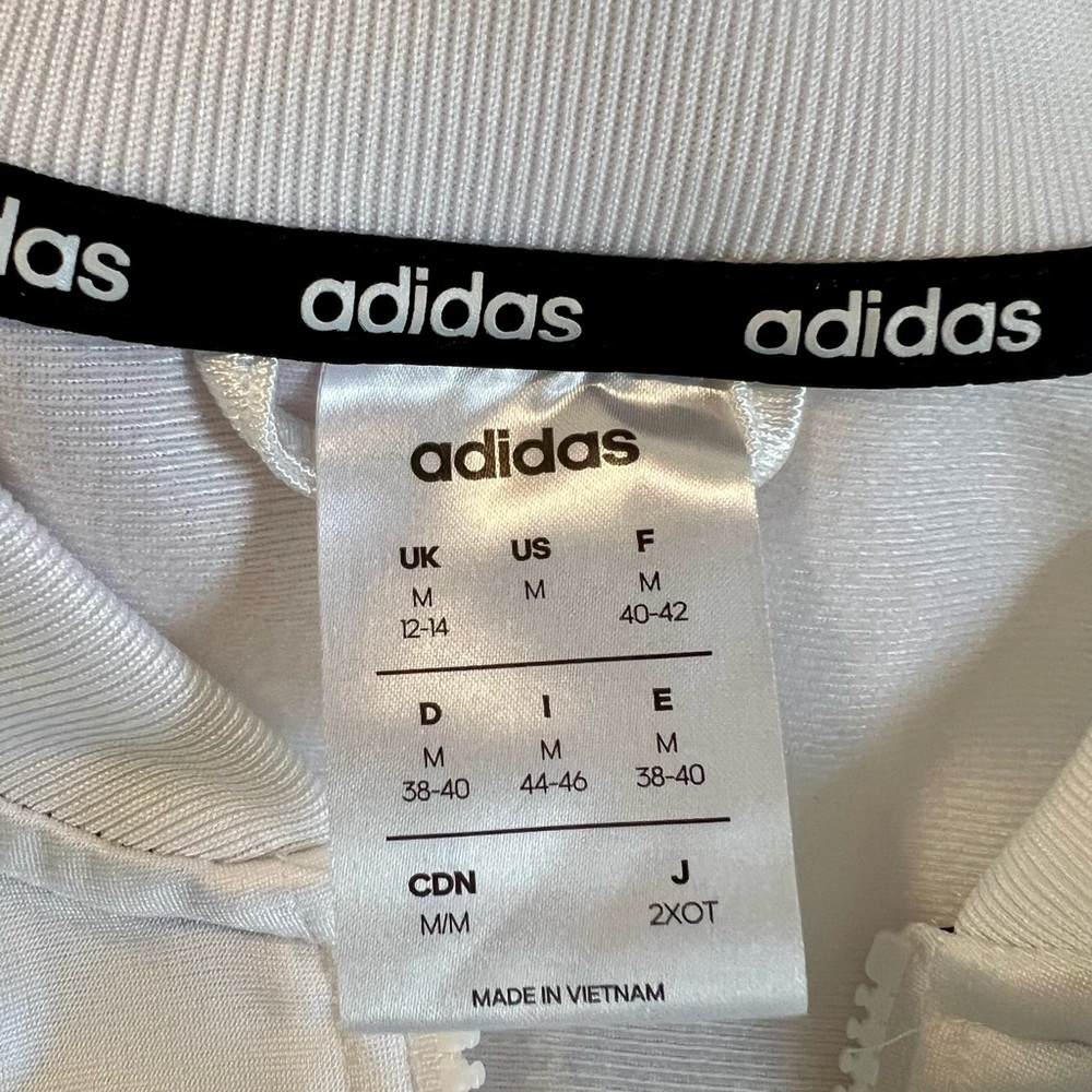 Women’s Adidas Jacket - White. NWOT - Never been worn. Size Medium.